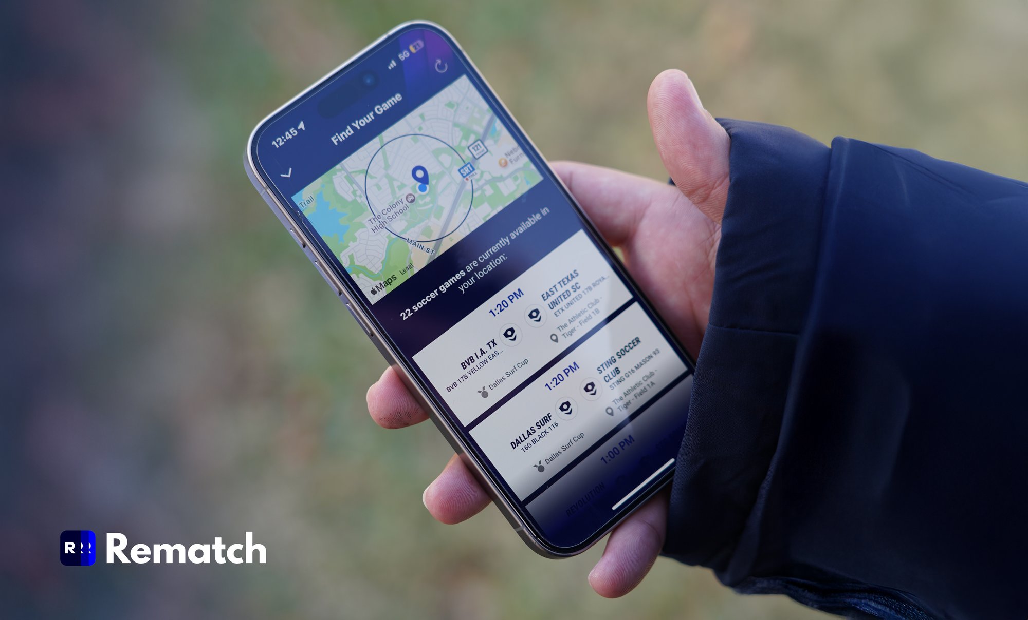 Closeup of hand holding a mobile phone displaying the Rematch app