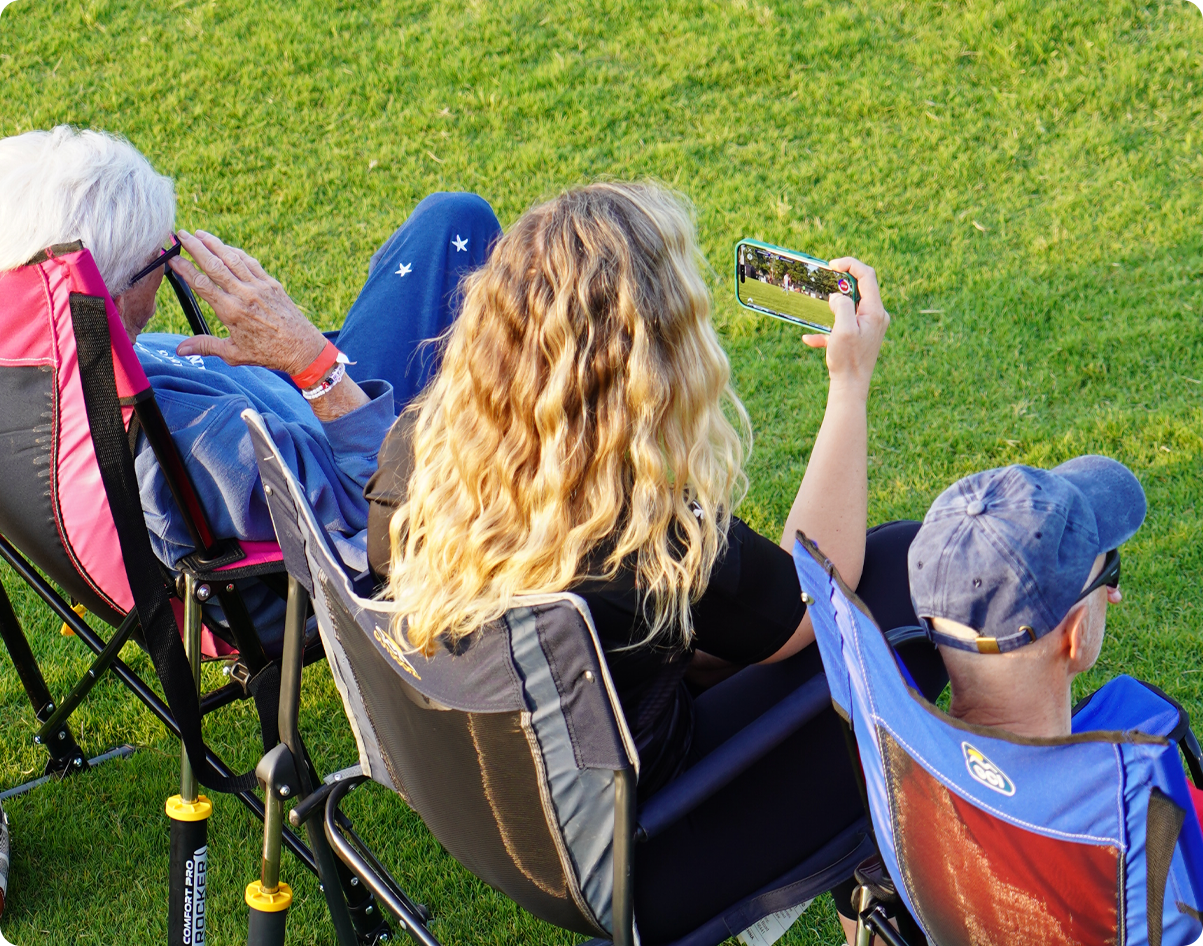 A parent capturing a game with the Rematch app
